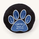 Plush Toronto Maple Mutts dog toy on a plain cream studio background